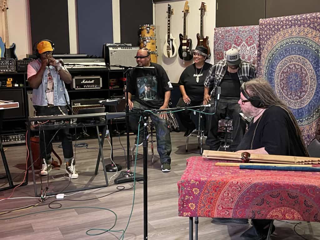 Kwame Holland, Jarod Lanier, Chilly Chill, Senyon Kelly in a recording studio session.
